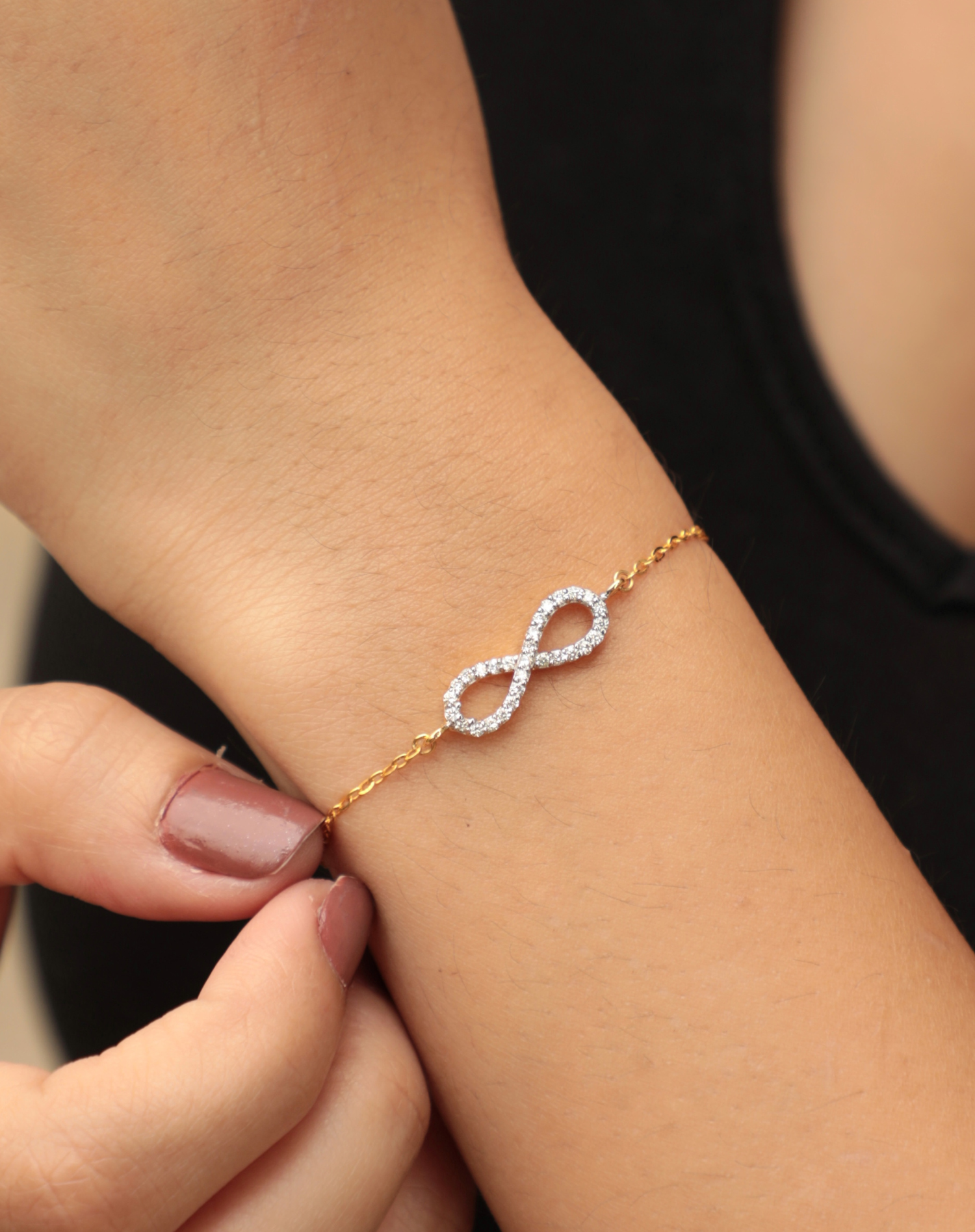 Buy Designbox Gold Tone CZ Diamond Studded Infinity Bracelet with  Adjustable String Online